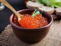 Salmon red caviar in bowl. Delicious food