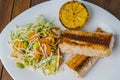 Salmon with salad and lemon