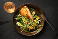 Salmon and salad on a plate Royalty Free Stock Photo