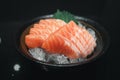 Salmon sashimi cutting fresh and raw pieces served on ice in a bowl Royalty Free Stock Photo