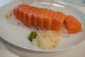 Salmon Sashimi fish Japanese food. Salmon raw sashimi on white plate Royalty Free Stock Photo