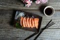 Salmon sashimi Japanese food with soy sauce on wooden table Royalty Free Stock Photo