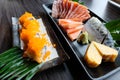 Salmon sashimi, saba pickled, Surimi crab stick, Tamagoyaki, wasabi and sushi roll Royalty Free Stock Photo