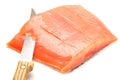 Salmon slicing with knife Royalty Free Stock Photo