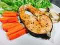 Salmon steak with black pepper