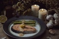 Salmon steak with cream sauce placing on vintage dish together with asparagus Royalty Free Stock Photo