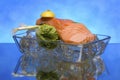 Salmon steak on crystal clear ice cubes Royalty Free Stock Photo