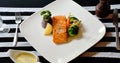 Salmon steak on dinner table Royalty Free Stock Photo