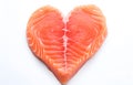 salmon steak like heart shape isolated on white background