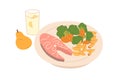 Salmon steak and steamed vegetables served on plate. Healthy food and drink for lunch, dinner or supper. Tasty balanced