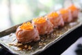 Salmon sushi ball with salmon caviar Royalty Free Stock Photo