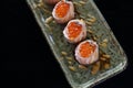 Salmon sushi ball with salmon caviar Royalty Free Stock Photo