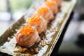 Salmon sushi ball with salmon caviar Royalty Free Stock Photo