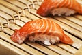 Salmon sushi on a bamboo tray