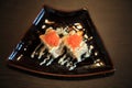 Salmon sushi with Japanese shrimp roe on wooden table Royalty Free Stock Photo