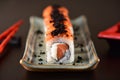 Salmon sushi roll aligned on plate Royalty Free Stock Photo