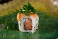 Salmon sushi roll aligned on plate Royalty Free Stock Photo
