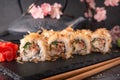 Salmon Sushi Roll In Tuna Flakes Sushi menu.