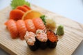 Salmon sushi and sashimi on wood plate Japanese food Royalty Free Stock Photo