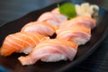 Salmon Sushi Set on Black Dish Royalty Free Stock Photo