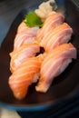 Salmon Sushi Set on Black Dish Royalty Free Stock Photo