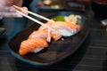 Salmon Sushi Set on Black Dish Royalty Free Stock Photo