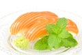 Salmon sushi with Wasabi and Mint leaves. Royalty Free Stock Photo