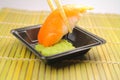 Salmon sushi and wasabi