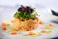 Salmon tartar with a salad grapefruit tomatoes