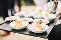 Salmon tartare in small plates, catering event