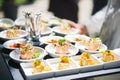 Salmon tartare in small plates, catering event