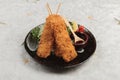 Salmon tempura sticks is deep fried salmon mixing with tempura flour served with sweet sauce. Royalty Free Stock Photo