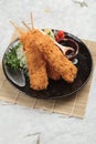 Salmon tempura sticks is deep fried salmon mixing with tempura flour served with sweet sauce. Royalty Free Stock Photo