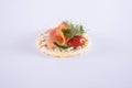 Salmon tomato and dill on a corn waffle