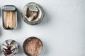 Salmon, tuna, trout mackerel and anchovy - Canned fish in tin cans, on white background, top view flat lay, with copyspace  and Royalty Free Stock Photo