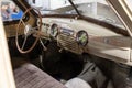 Salon interior of soviet retro car gaz m20 with vintage steering wheel and soft seats in good condition