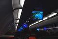 Salon of a modern airliner during a night flight. Royalty Free Stock Photo