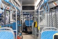 Salon of the new city bus, inside view. Public transport interior. Transportation of passengers. Commercial vehicles