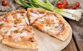 Salon Pizza on wooden background