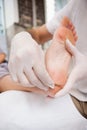 Salon worker using a scalpel Royalty Free Stock Photo