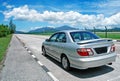 Saloon car on the road