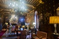 Saloon for small talks in paneled room of De Haar Castle