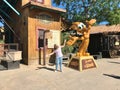 Salou, Spain, June 2019 - A statue of a person doing a trick on a skateboard