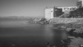 Salou, Tarragona. B/W hotel building in front of the silky water