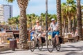 SALOU, TARRAGONA, SPAIN - SEPTEMBER 17, 2017: Cyclists ride along the waterfront. Copy space for text.