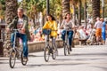 SALOU, TARRAGONA, SPAIN - SEPTEMBER 17, 2017: Cyclists ride along the waterfront. Copy space for text.