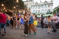 Salsa dancers in outdoor cafe near Diana fountain at Market square in Lviv