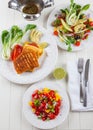 Salsa salad with grilled cheese Royalty Free Stock Photo