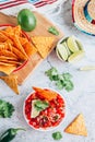 Salsa sauce and nacho chips on gray marble background. Mexican salsa sauce Royalty Free Stock Photo