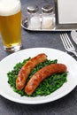 Salsiccia e cime di rapa, sausage and braised tunip greens Royalty Free Stock Photo